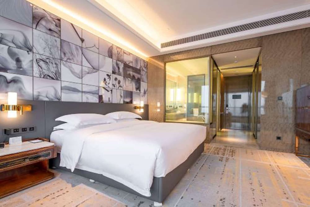 Imagen de la habitación del Hotel Wyndham Grand Suzhou Fenhu. Foto 6
