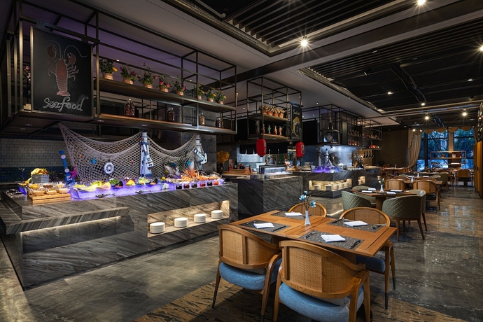 Imagen del bar/restaurante del Hotel Wyndham Grand Taixing Downtown. Foto 2