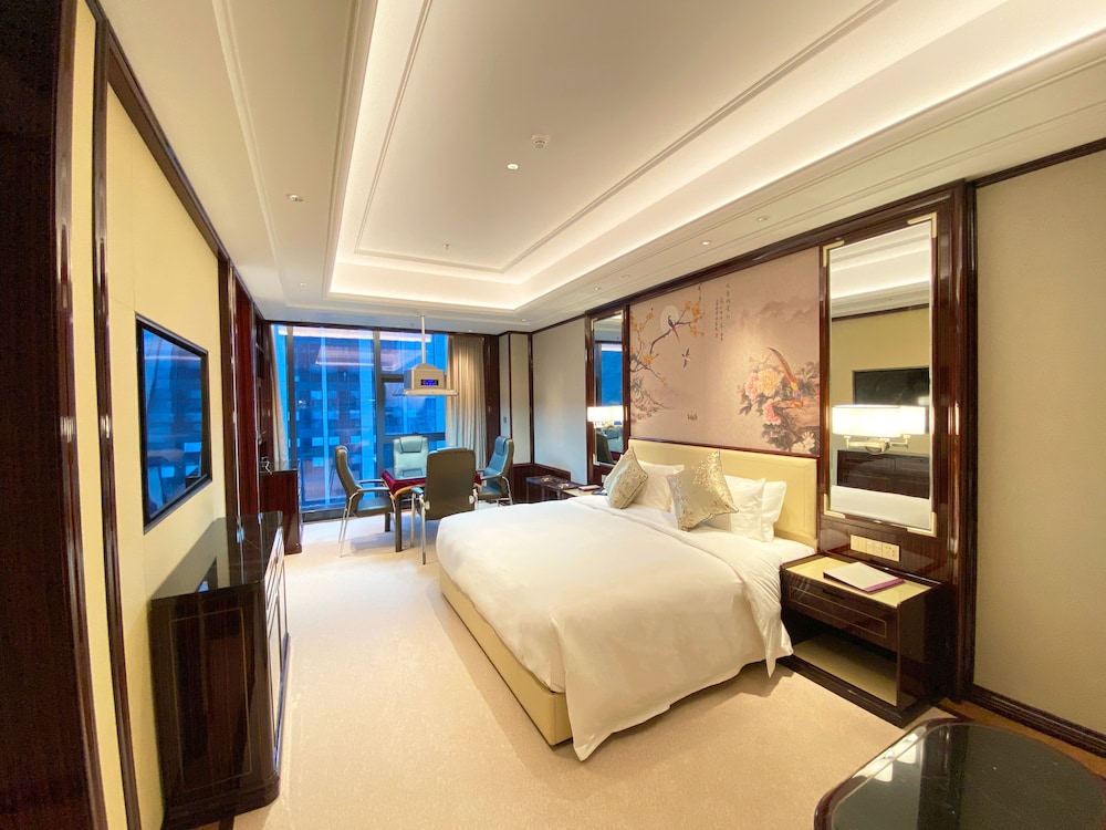 Imagen de la habitación del Hotel Wyndham Grand Tongren Downtown. Foto 3