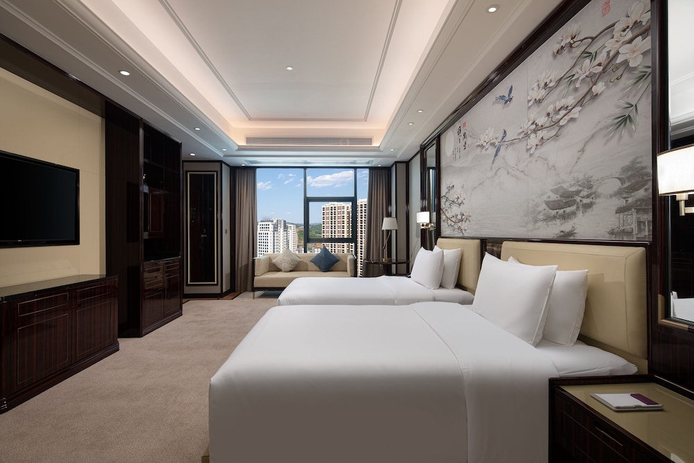 Imagen de la habitación del Hotel Wyndham Grand Tongren Downtown. Foto 11