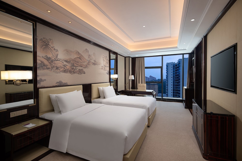 Imagen de la habitación del Hotel Wyndham Grand Tongren Downtown. Foto 12