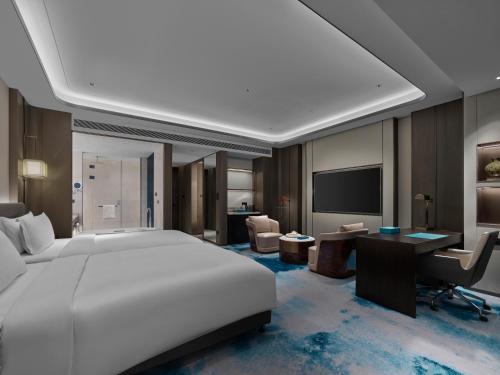 Imagen de la habitación del Hotel Wyndham Grand Zaozhuang. Foto 17