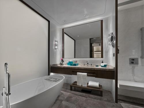 Imagen de la habitación del Hotel Wyndham Grand Zaozhuang. Foto 18