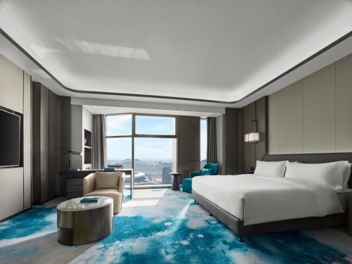 Imagen de la habitación del Hotel Wyndham Grand Zaozhuang. Foto 20