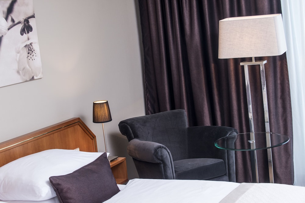 Imagen de la habitación del Hotel Wyndham Hannover Atrium. Foto 10