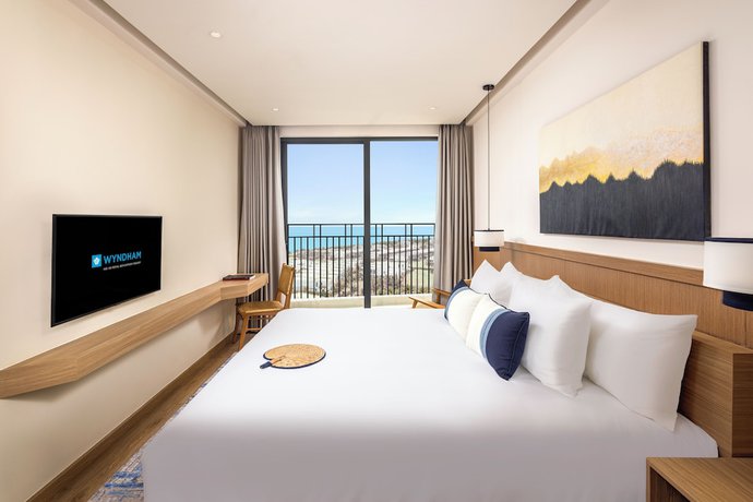 Imagen de la habitación del Hotel Wyndham Hoi An Royal Beachfront Resort and Villas. Foto 12