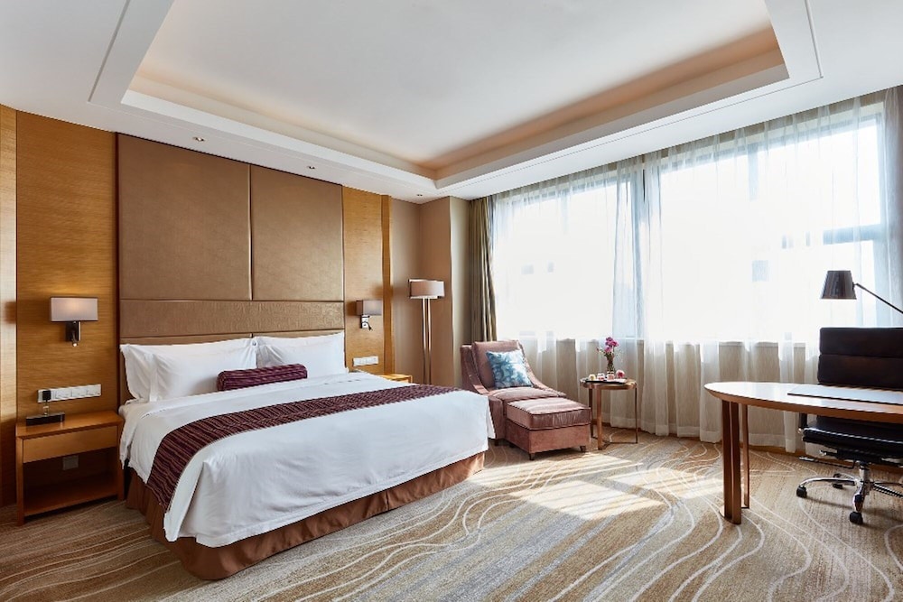 Imagen de la habitación del Hotel Wyndham Jingzhou. Foto 14