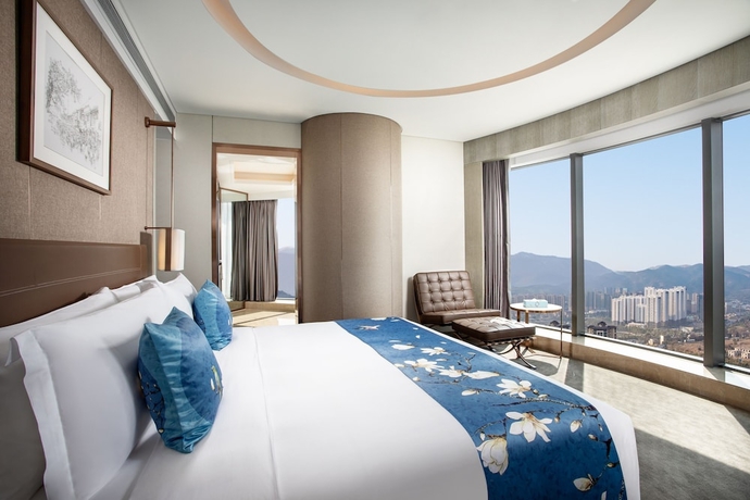 Imagen de la habitación del Hotel Wyndham Kunming Panlong. Foto 2