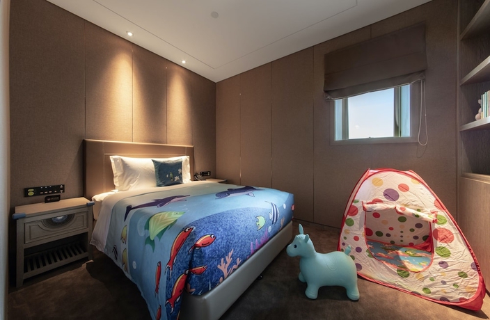 Imagen de la habitación del Hotel Wyndham Kunming Panlong. Foto 15