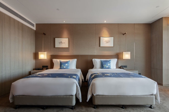 Imagen de la habitación del Hotel Wyndham Kunming Panlong. Foto 16