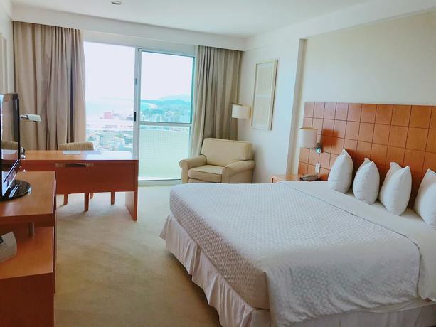 Imagen de la habitación del Hotel Wyndham Macae. Foto 8