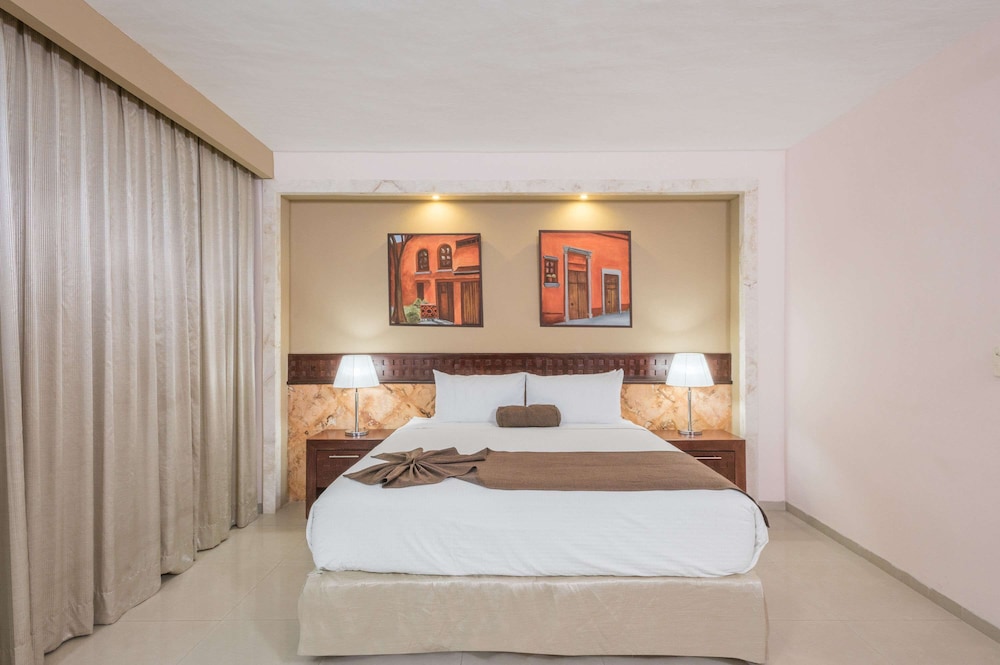 Imagen de la habitación del Hotel Wyndham Merida. Foto 12