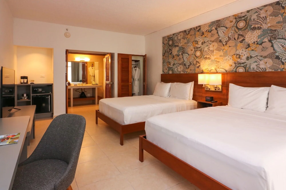 Imagen de la habitación del Hotel Wyndham Palmas Beach and Golf Boutique Resort. Foto 7