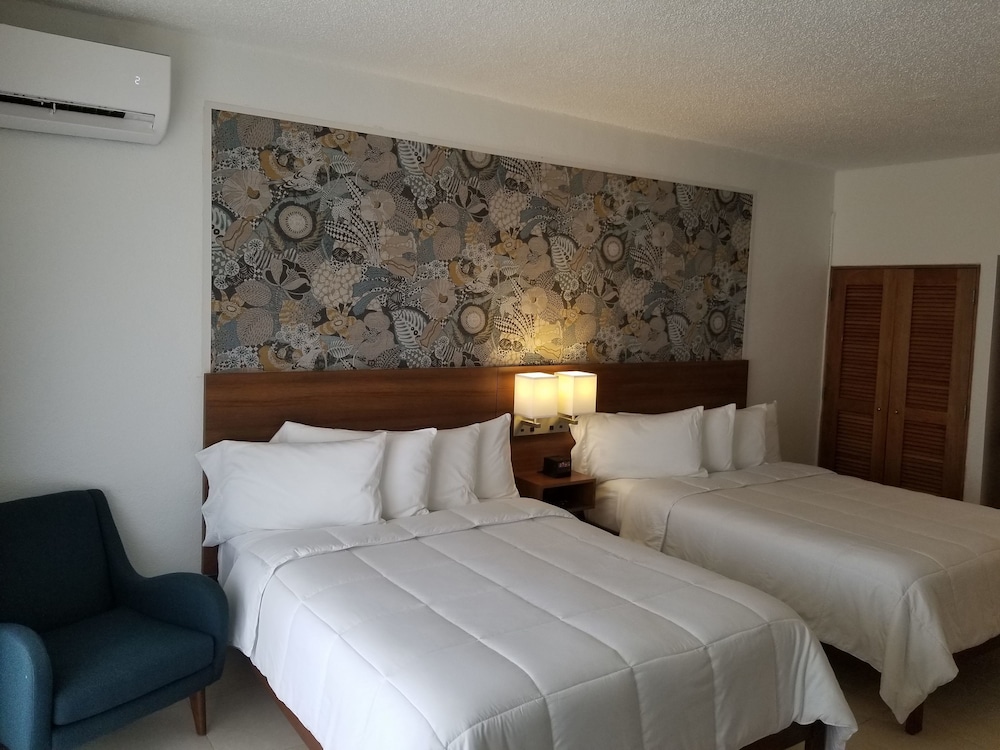 Imagen de la habitación del Hotel Wyndham Palmas Beach and Golf Boutique Resort. Foto 8