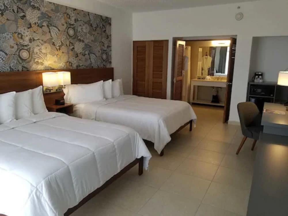 Imagen de la habitación del Hotel Wyndham Palmas Beach and Golf Boutique Resort. Foto 11