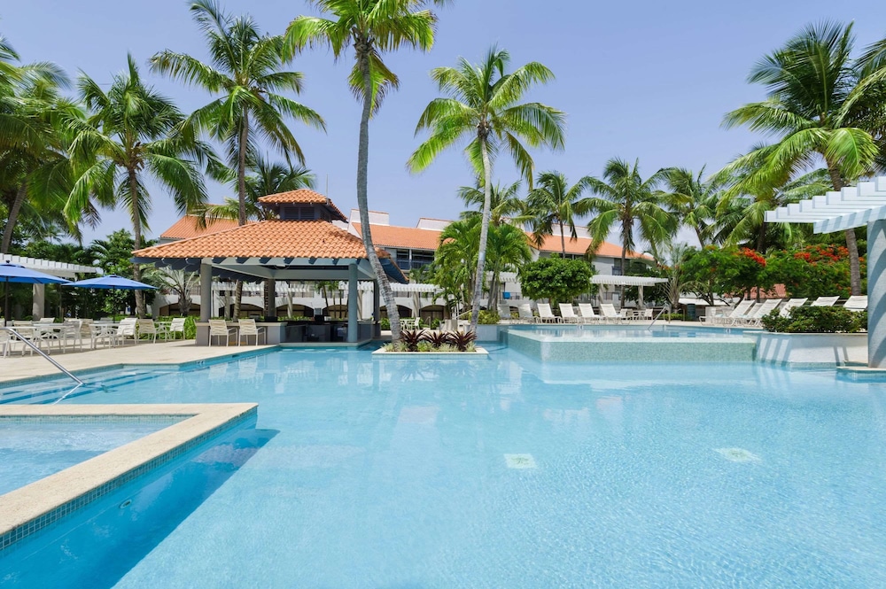 Imagen de la piscina del Hotel Wyndham Palmas Beach and Golf Boutique Resort. Foto 17