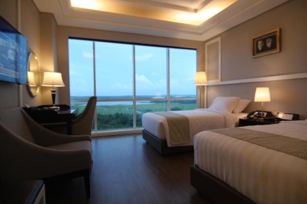 Imagen de la habitación del Hotel Wyndham Panbil Batam. Foto 14