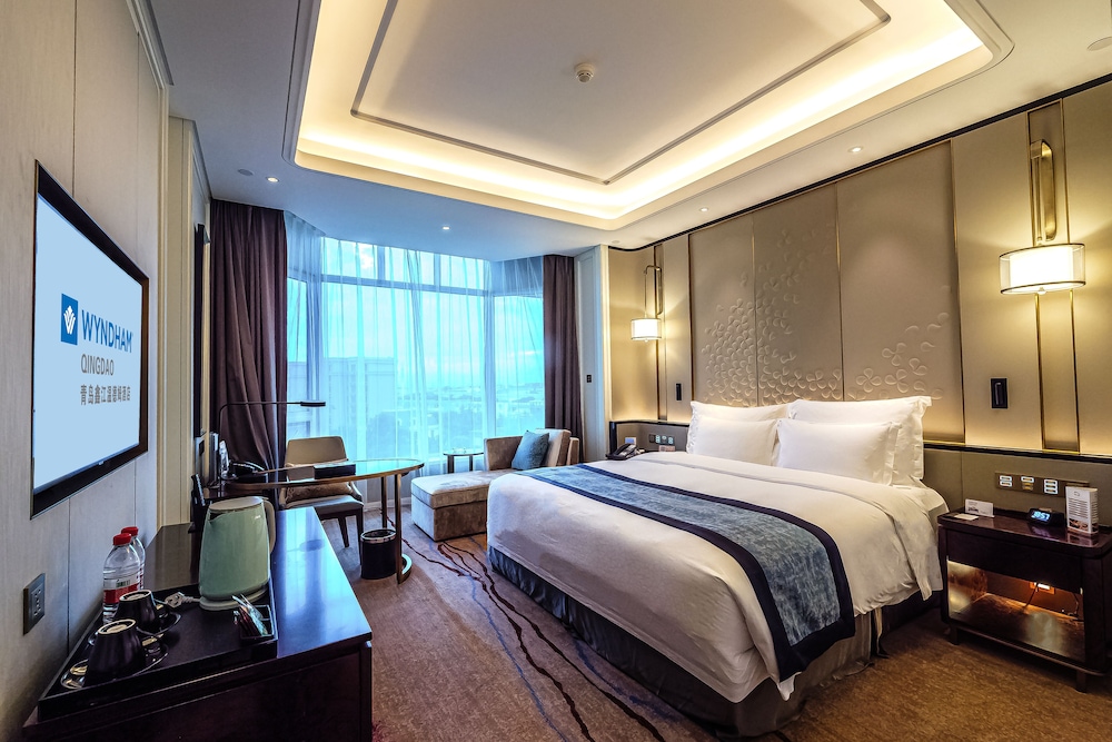 Imagen de la habitación del Hotel Wyndham Qingdao. Foto 2