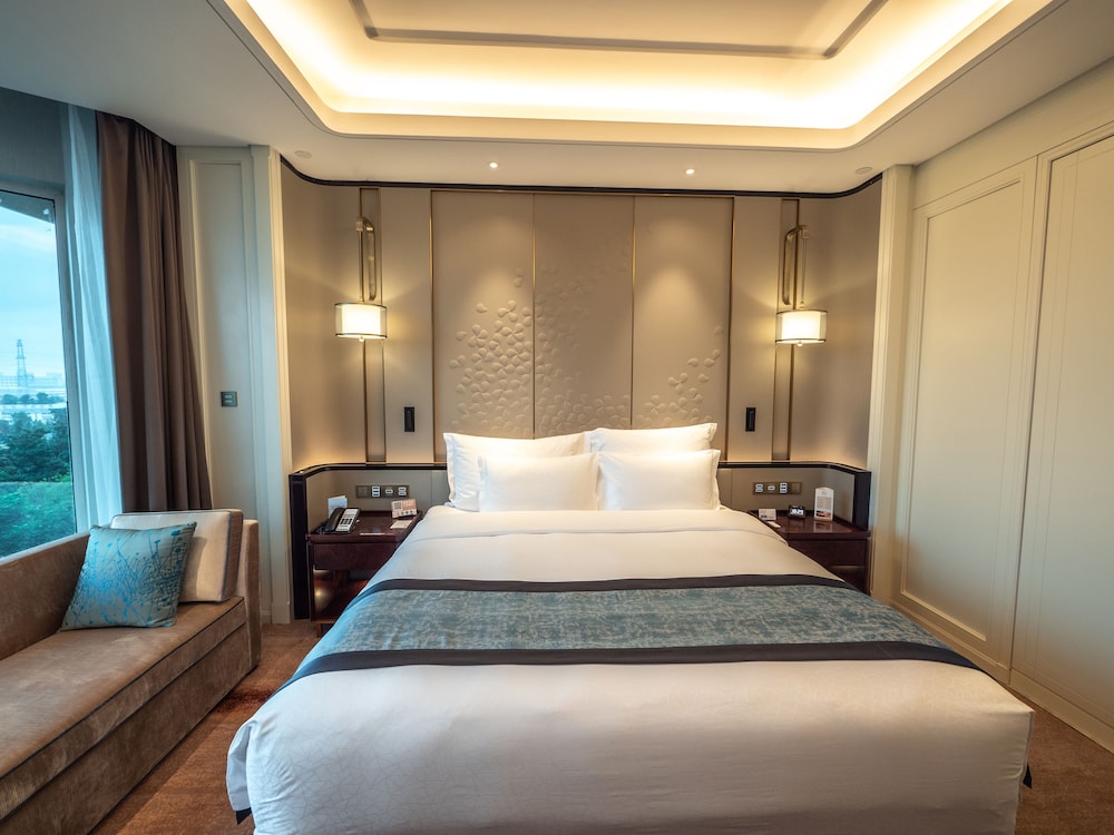 Imagen de la habitación del Hotel Wyndham Qingdao. Foto 3