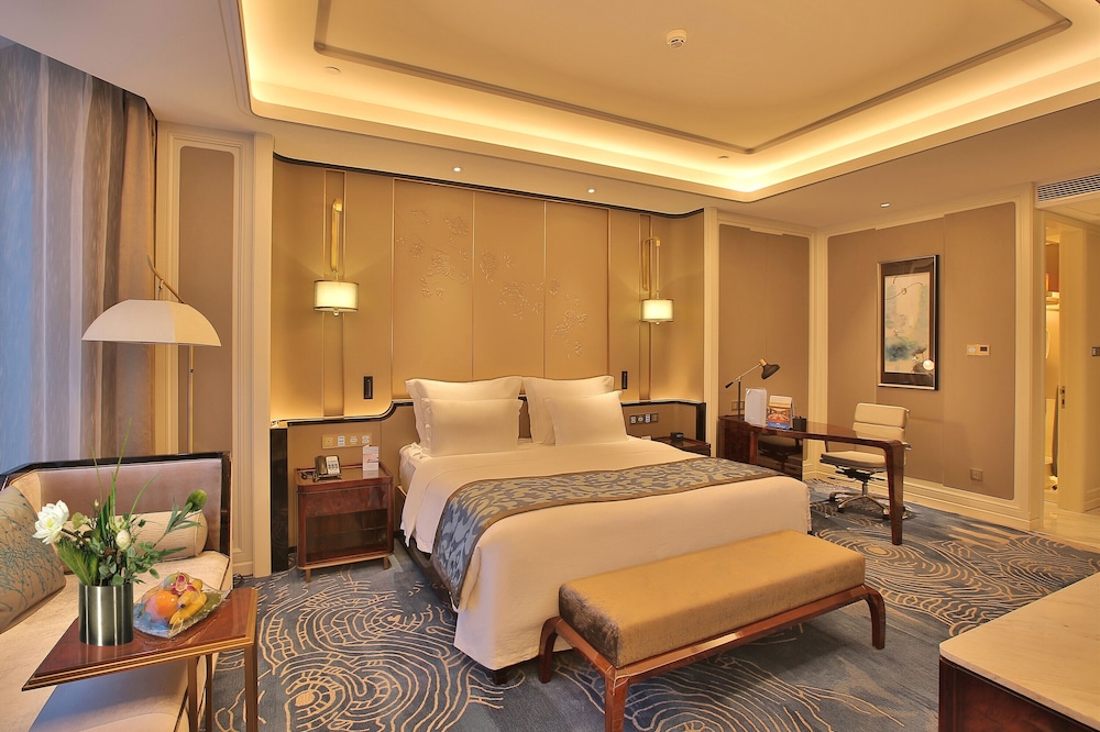 Imagen de la habitación del Hotel Wyndham Qingdao. Foto 6