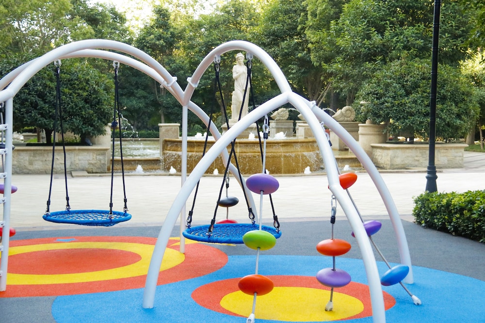 Imagen de la habitación del Hotel Wyndham Qingdao. Foto 8