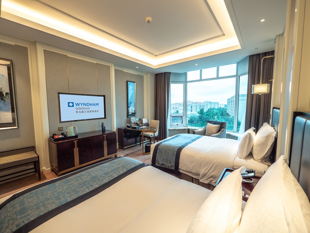 Imagen de la habitación del Hotel Wyndham Qingdao. Foto 10