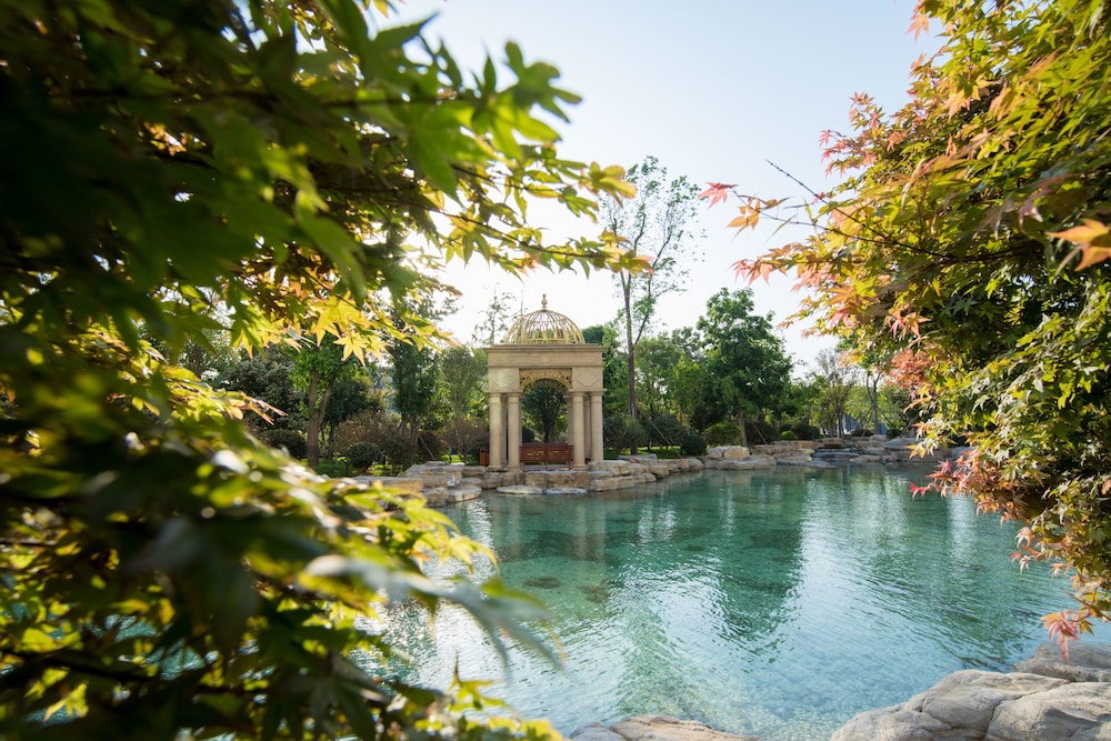Imagen de la habitación del Hotel Wyndham Qingdao. Foto 11