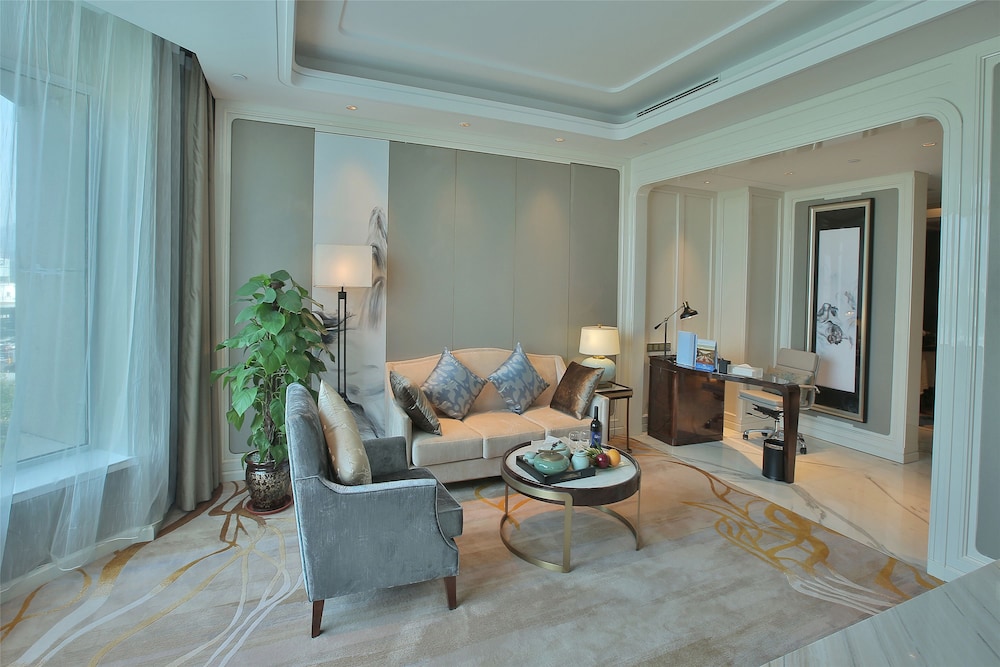 Imagen de la habitación del Hotel Wyndham Qingdao. Foto 13