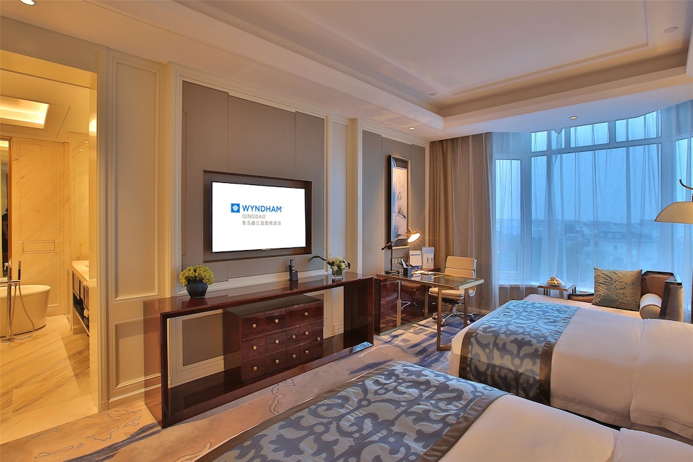 Imagen de la habitación del Hotel Wyndham Qingdao. Foto 14