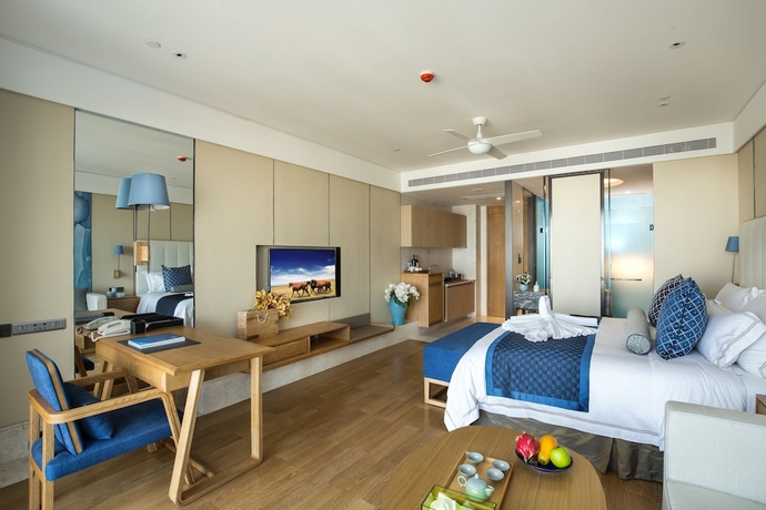 Imagen de la habitación del Hotel Wyndham Sanya Bay. Foto 4