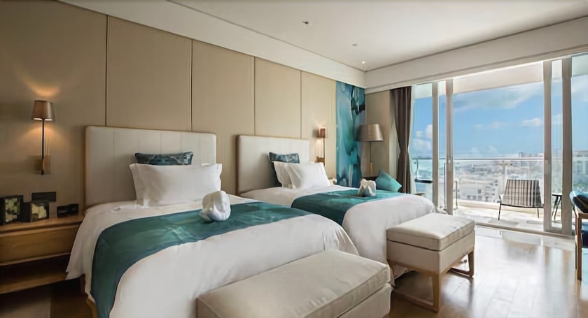 Imagen de la habitación del Hotel Wyndham Sanya Bay. Foto 12
