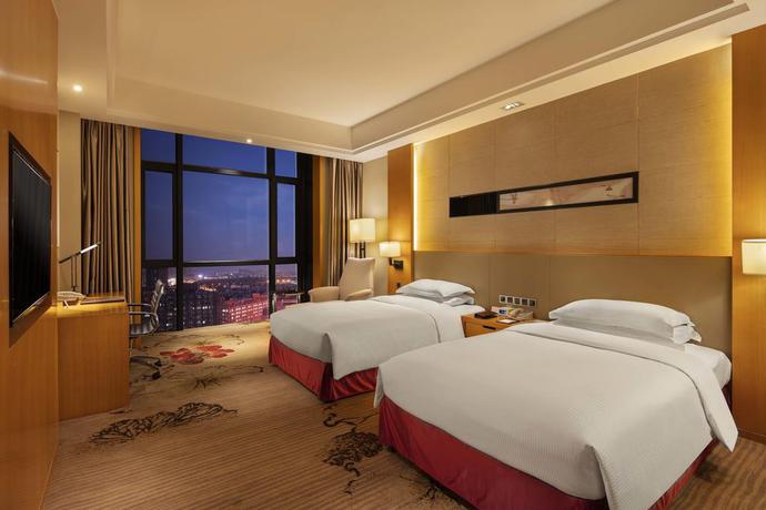 Imagen de la habitación del Hotel Wyndham Shanghai Nanxiang. Foto 8