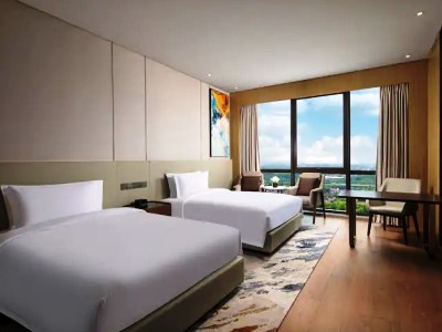 Imagen de la habitación del Hotel Wyndham Shanghai Pudong. Foto 4