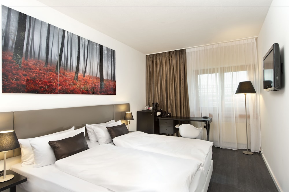 Imagen de la habitación del Hotel Wyndham Stuttgart Airport Messe. Foto 6
