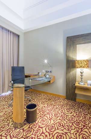 Imagen de la habitación del Hotel Wyndham Surabaya City Centre. Foto 2