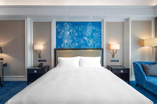 Imagen de la habitación del Hotel Wyndham Taian West. Foto 10
