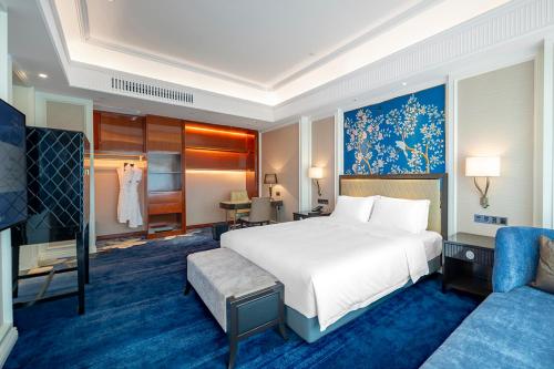 Imagen de la habitación del Hotel Wyndham Taian West. Foto 11
