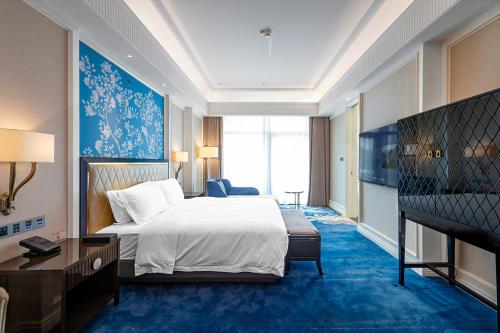 Imagen de la habitación del Hotel Wyndham Taian West. Foto 12