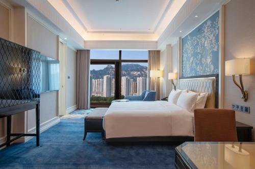 Imagen de la habitación del Hotel Wyndham Taian West. Foto 14
