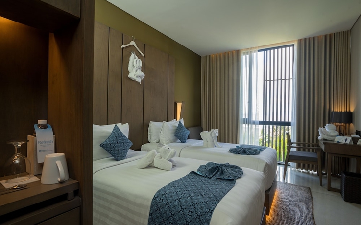 Imagen de la habitación del Hotel Wyndham Tamansari Jivva Resort Bali. Foto 7