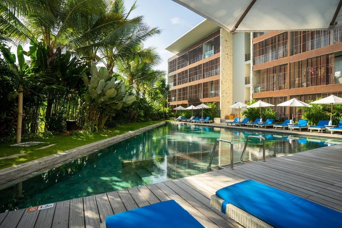 Imagen de la piscina del Hotel Wyndham Tamansari Jivva Resort Bali. Foto 19