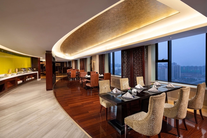 Imagen del bar/restaurante del Hotel Wyndham Xinyang Downtown. Foto 3