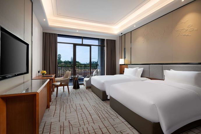 Imagen de la habitación del Hotel Wyndham Xinyi Lotus Lake. Foto 2