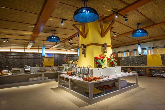 Imagen del bar/restaurante del Hotel Wyndham Xishuangbanna South Resort. Foto 3