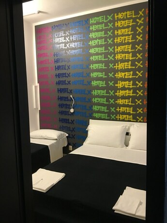 Imagen de la habitación del Hotel X, Ravenna. Foto 13