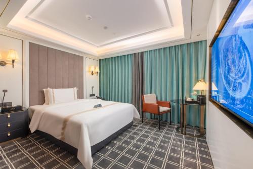 Imagen de la habitación del Hotel XANA Deluxe Guangzhou Xintang South High-speed Railway Station. Foto 13
