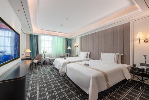 Imagen de la habitación del Hotel XANA Deluxe Guangzhou Xintang South High-speed Railway Station. Foto 14