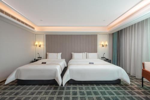 Imagen general del Hotel XANA Deluxe Guangzhou Xintang South High-speed Railway Station. Foto 5