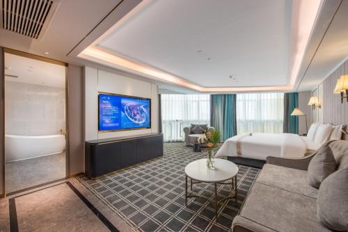 Imagen de la habitación del Hotel XANA Deluxe Guangzhou Xintang South High-speed Railway Station. Foto 15