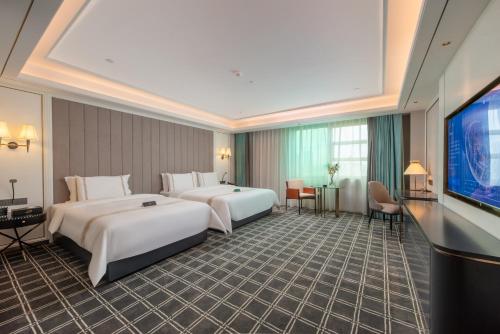 Imagen de la habitación del Hotel XANA Deluxe Guangzhou Xintang South High-speed Railway Station. Foto 16